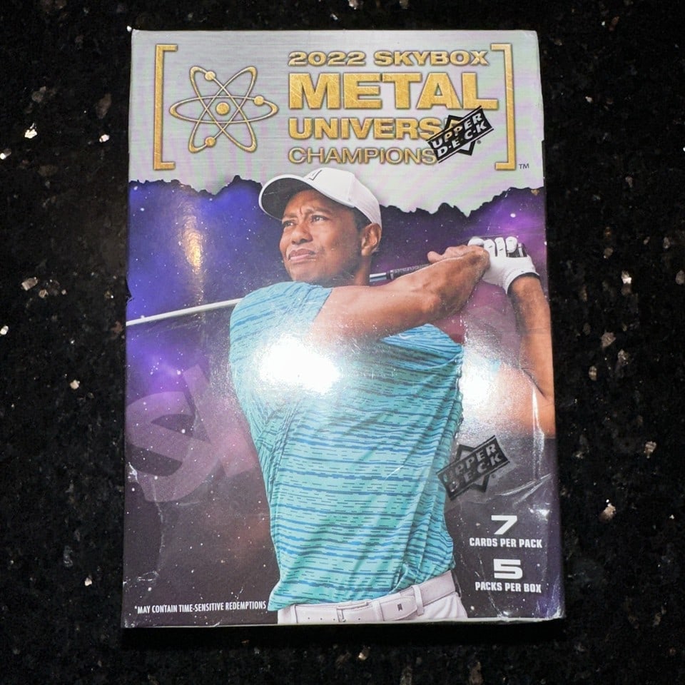 2022 Upper Deck Skybox Metal Universe Champions Blaster Box: The 2022 Upper Deck Skybox Metal Universe Champions Blaster Box is a sealed trading card box featuring various sports trading cards. This box contains cards from the 2022 Skybox Metal Universe Champio