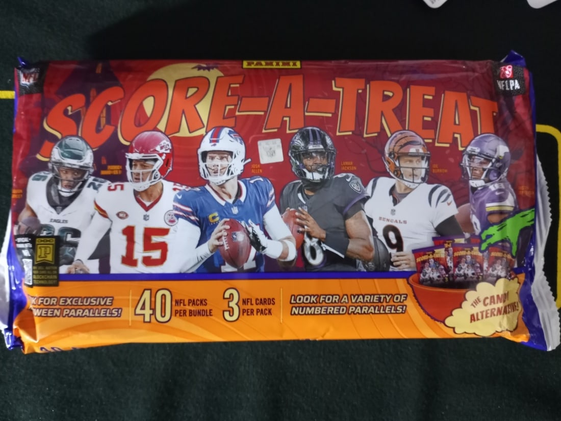 2025 Panini Score-A-Treat NFL Football Trading Cards 40 Packs: The 2025 Panini Score-A-Treat NFL 40 Pack Bundle is a highly sought-after collection of standard-sized football trading cards featuring players from the National Football League (NFL). With a total of