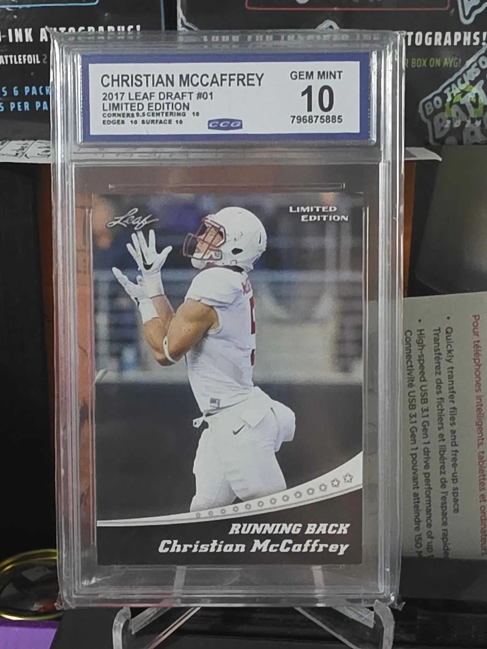 2017 Leaf Draft - Limited Edition #01 Christian McCaffrey (RC) CCG Gem Mint 10: The product is a 2017 Leaf Draft Limited Edition #01 Christian McCaffrey rookie trading card, graded as a Gem Mint 10. This collectible features the standout football player from Stanford Cardinal in 