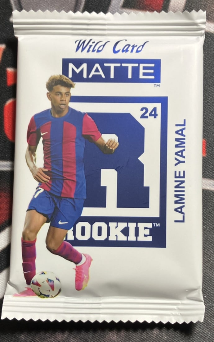 Wild Card Matte Rookie 2024 Soccer Trading Card Pack Lamine Yamal Rookie: The Wild Card Matte Rookie 2024 Soccer Trading Card Pack features a rookie card of Lamine Yamal from the 2024 season. This sports trading card is part of the Matte Rookie set manufactured by Wild Card