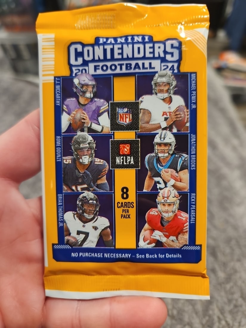 2024 Panini Contenders Football NFL Trading Card Factory Sealed 8 Card Pack: The 2024 Panini Contenders Football NFL Trading Card is a factory-sealed 8-card pack featuring top NFL players like Joe Burrow, Trevor Lawrence, and Kenny Pickett. Each card is made of high-quality