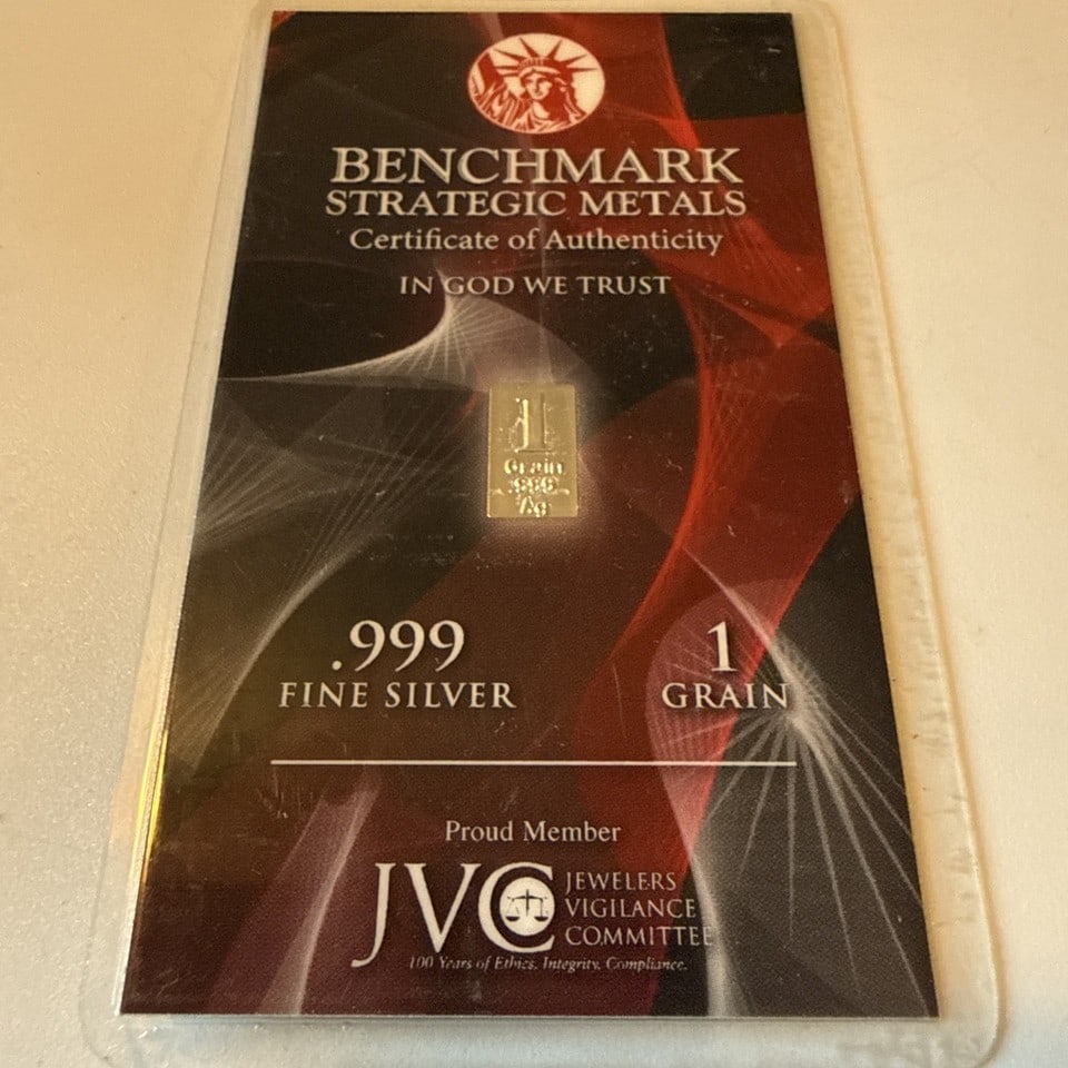 1 Grain .999 Fine Silver Bullion Bar - Benchmark Strategic Metals. JVC: The product is a 1 Grain .999 Fine Silver Bullion Bar by Benchmark Strategic Metals. This bar is composed of silver with a fineness of 0.999, making it a valuable investment for those looking to add