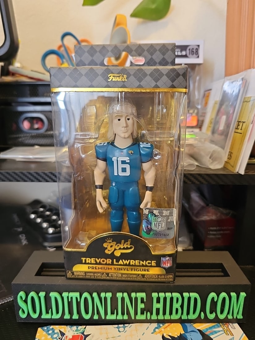 NFL: Jaguars Trevor Lawrence 5" Tall Collectible Vinyl Gold Chase: The Funko Pop Premium Vinyl Figure featuring Trevor Lawrence in a gold color is a limited edition collectible perfect for NFL football fans. This officially licensed product is part of Funko's Pop