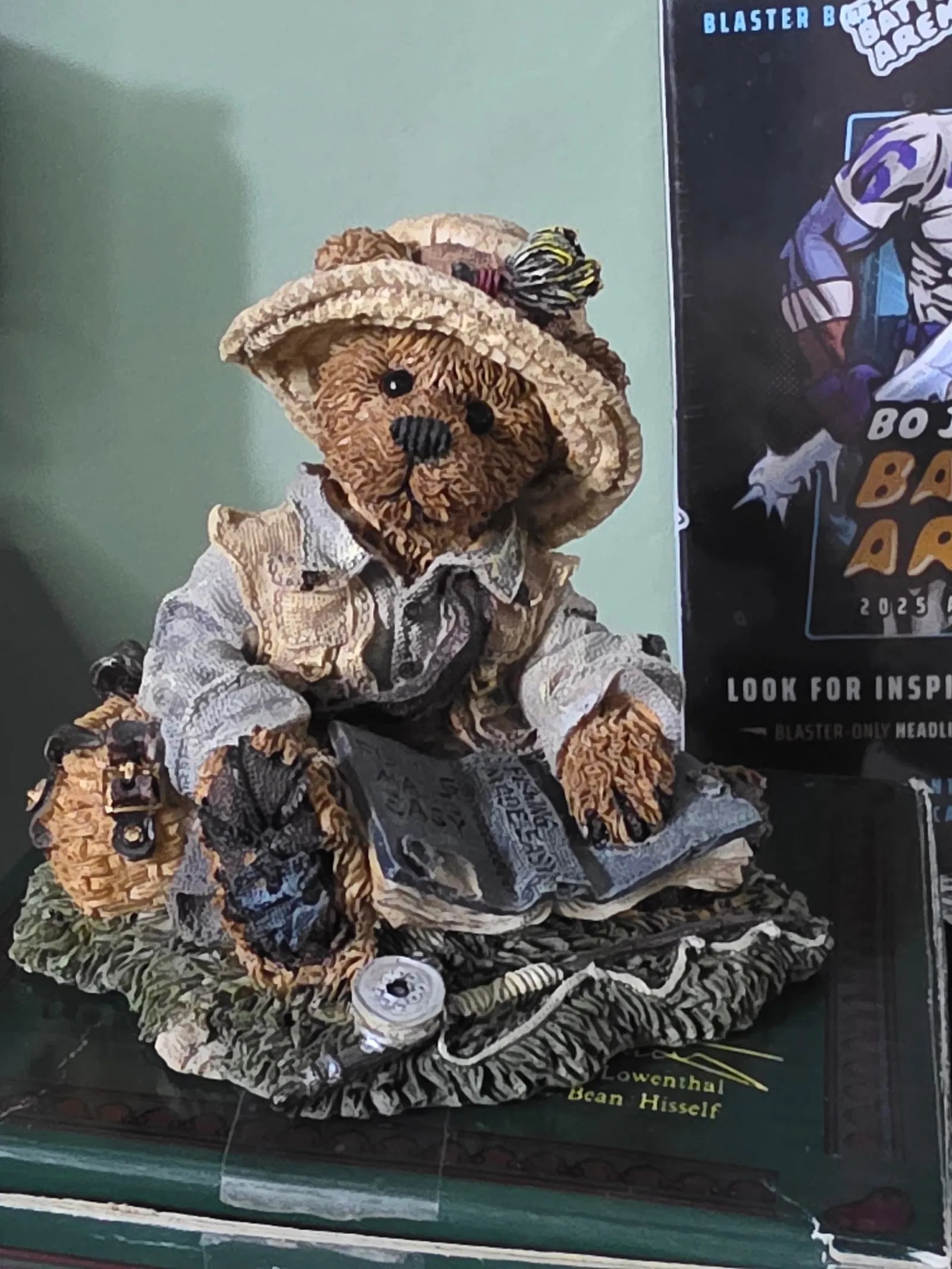BOYDS BEARS BEARSTONES: "OTIS THE FISHERMAN" STYLE2249-06: This product is a Boyds Bears/Bearstone figurine of a fisherman named Otis. It was manufactured in 1994 and is part of the Bearstones collection. The figurine is made of resin and has a textured
