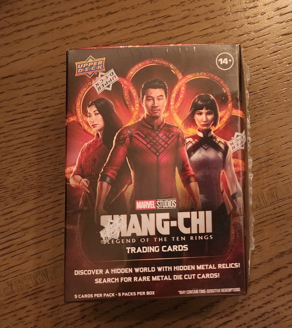 UPPER DECK MARVEL STUDIOS SHANG-CHI LEGEND OF THE TEN RINGS blaster BOX OF 5 PACK: The SHANG-CHI LEGEND OF THE TEN RINGS - UPPER DECK - SEALED BLASTER BOX is a highly sought-after collectible featuring standard-sized cards made of card stock and plastic materials. This exclusive box