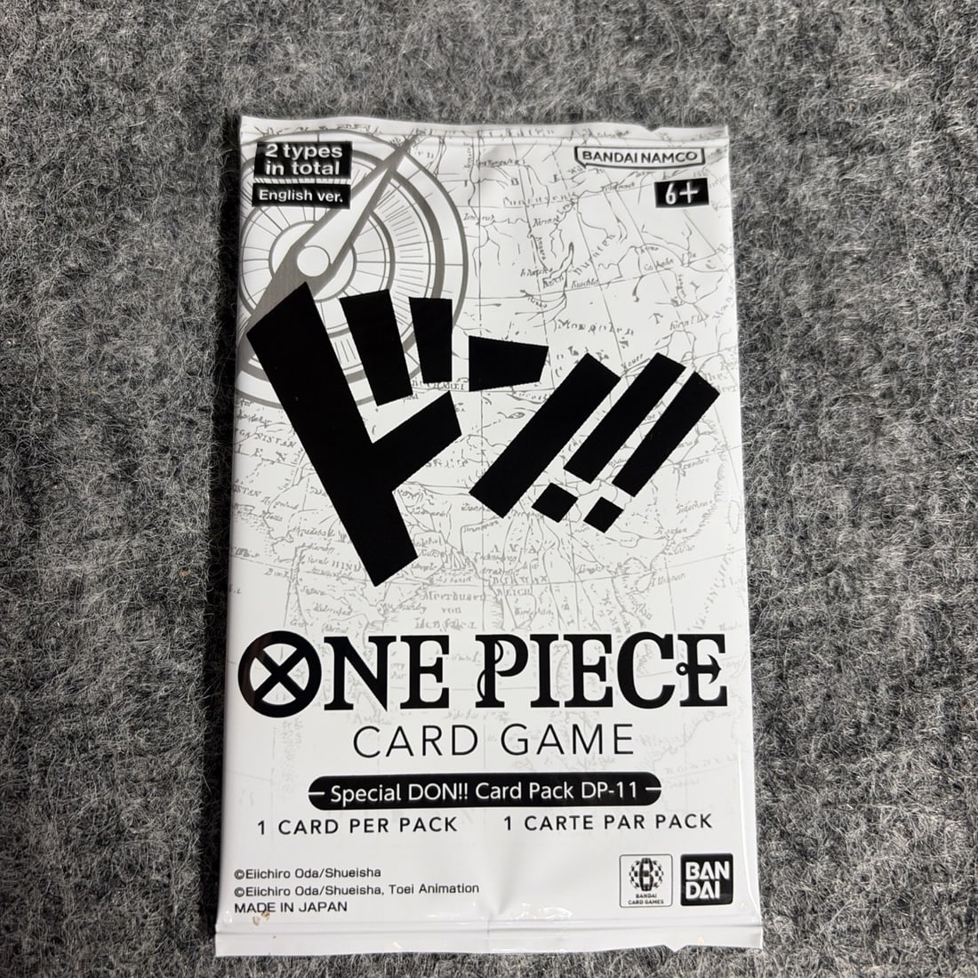 One Piece TCG Game Special DON!! Card Pack DP-11 SEALED OP16: The product is a special promo pack for the One Piece Card Game featuring the character DON!!. This pack is in English and manufactured by Bandai Namco in Japan. It includes 1 sealed pack with a