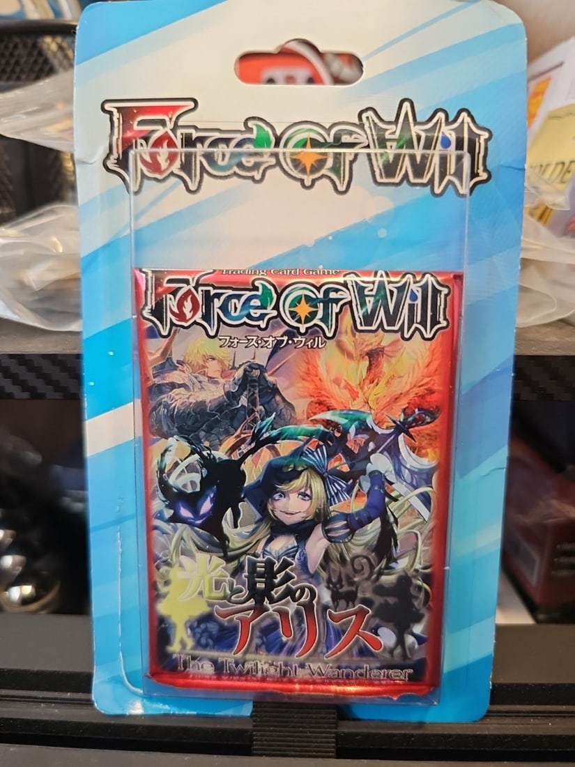 Force of Will The Twilight Wanderer Blister Pack: The product is a new, sealed English booster pack of Force of Will trading cards from the set "The Twilight Wanderer". This pack contains 10 standard-sized cards and is manufactured by FORCE OF WILL