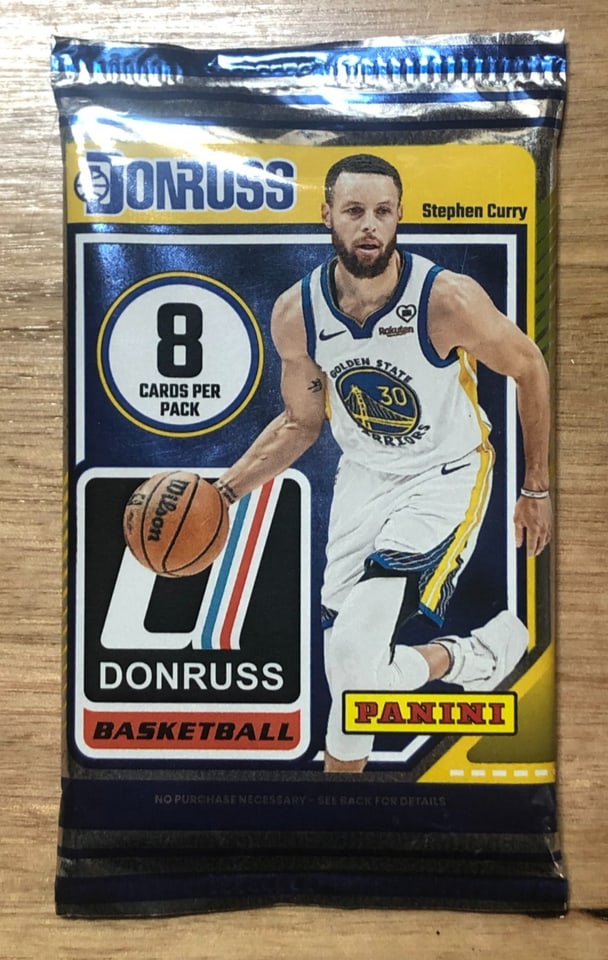 2024-25 Panini Donruss Basketball NBA 8 card Pack: The 2024-25 Panini Donruss Basketball NBA Pack contains a standard-sized set of 8 sports trading cards featuring players from the National Basketball Association (NBA). These cards are made of card st