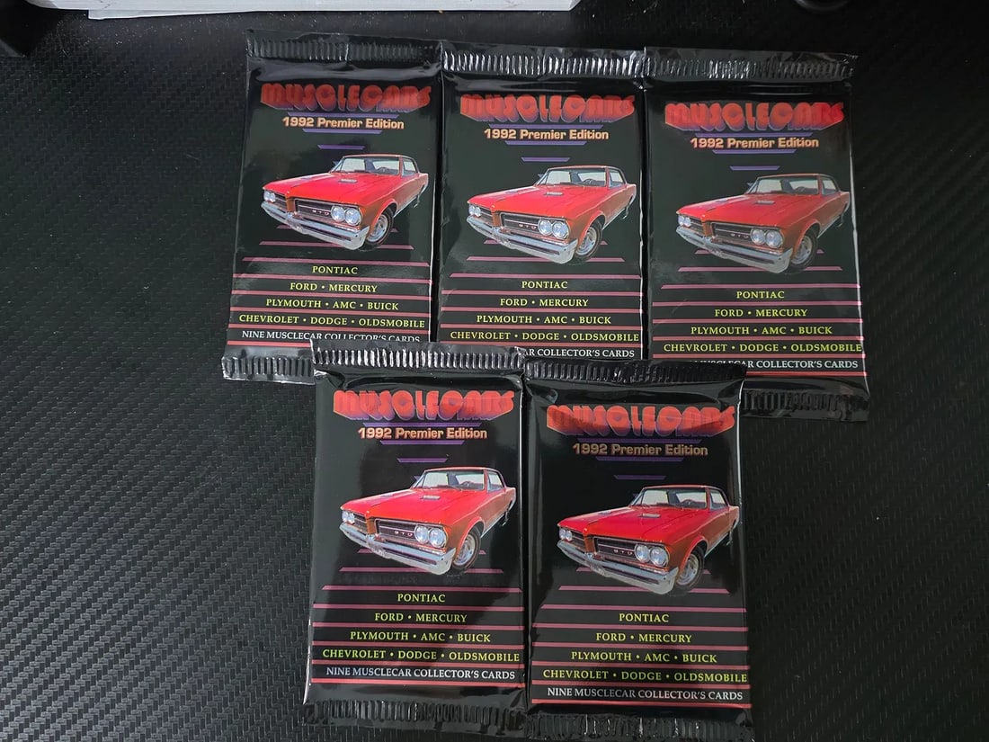 1992 Collect-A-Card Muscle Cars Premier Edition Sealed Pack 9 Cards Inside: The 1992 Collect-A-Card Muscle Cars Premier Edition pack is a vintage non-sport trading card pack manufactured in the United States. The pack contains 9 cards made of card stock material, featuring