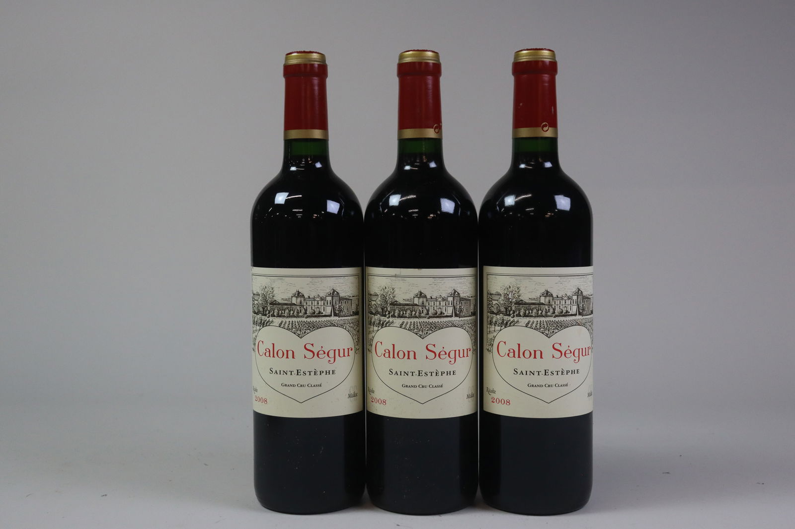 Mixed Lot Château Calon Ségur 2008/2013/2014: Château Calon Ségur 2008 Saint-Estèphe, 3ème Grand Cru Classé Excellent level and appearance R 3 bottles Château Calon Ségur 2013 Saint-Estèphe, 3ème