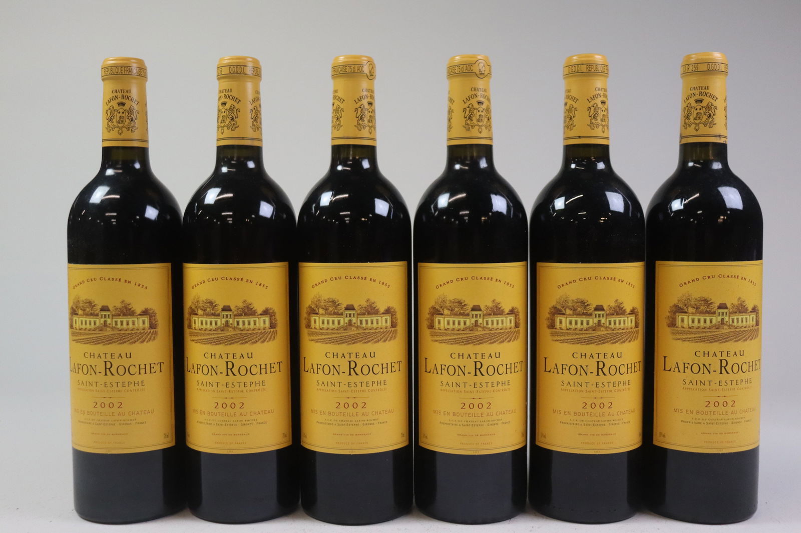 Château Lafon-Rochet 2002: Château Lafon-Rochet 2002 Saint-Estèphe, 4ème Grand Cru Classé Excellent level and appearance R 12 bottles Per lot €380 - 480SizebottlesConditionExcellent level and