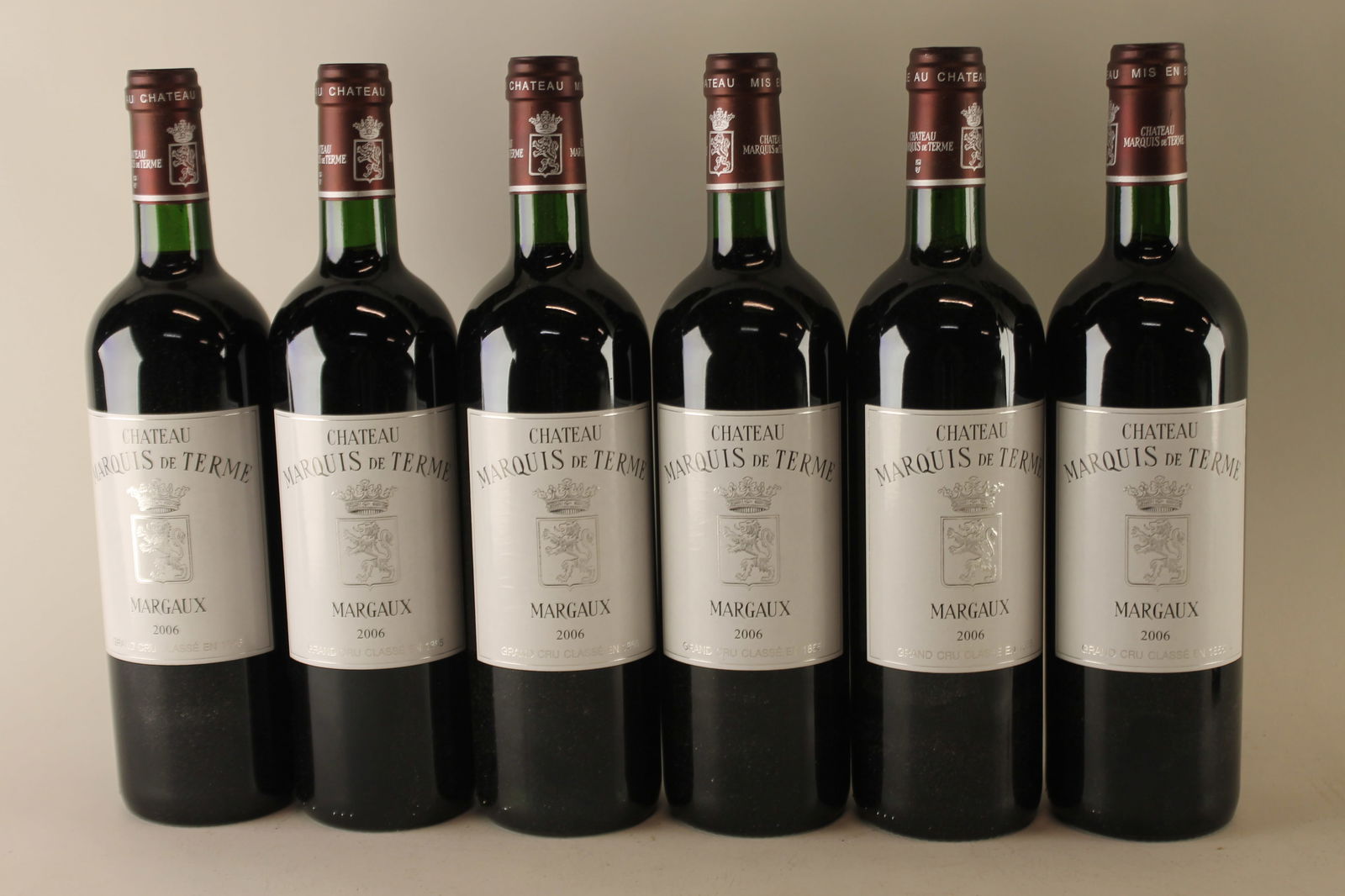 Château Marquis de Terme 2006: Château Marquis de Terme 2006 Margaux, 4ème Grand Cru Classé Excellent level and appearance R 12 bottles Per lot €380 - 480 Size bottles Condition Excel