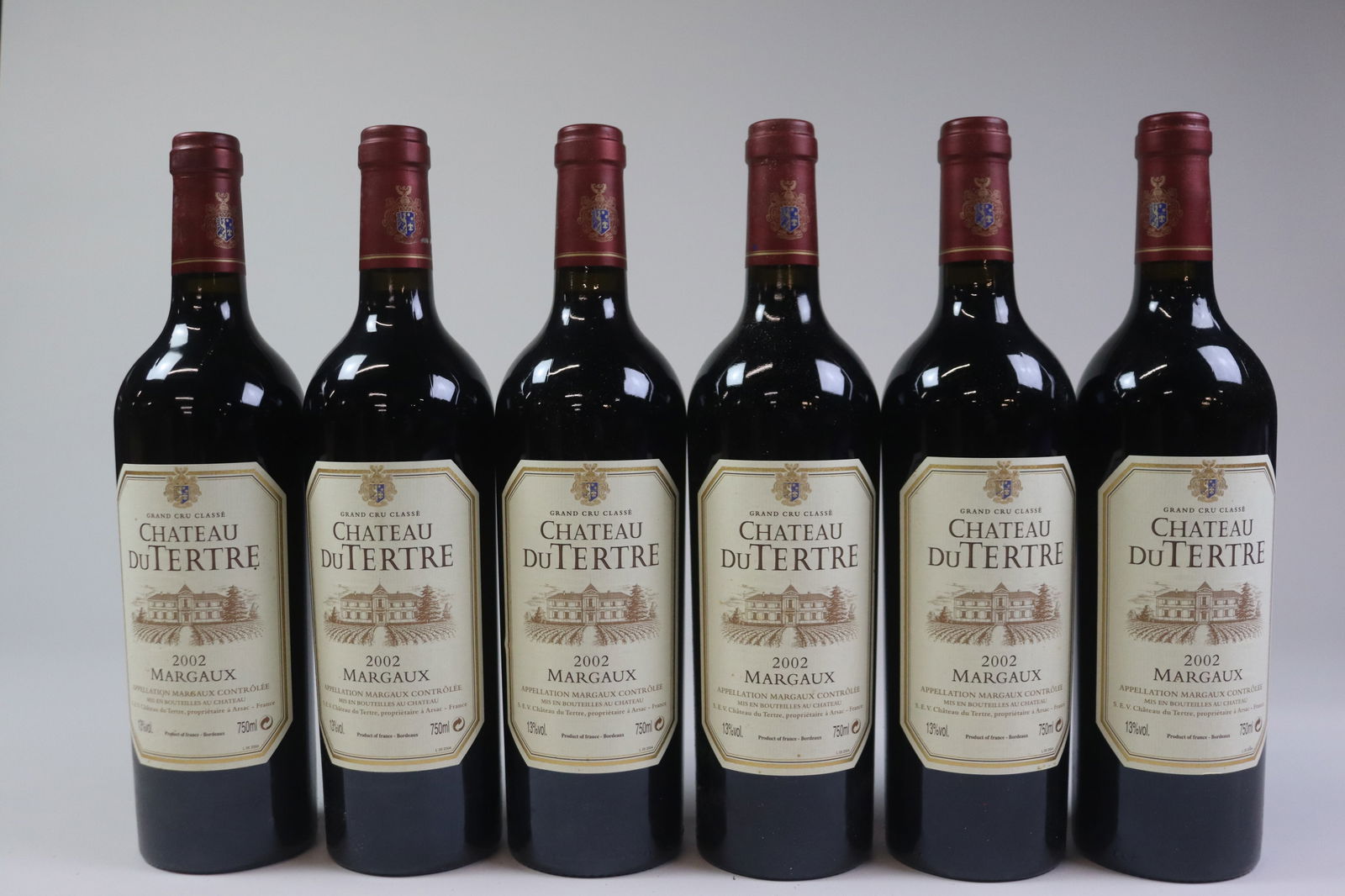 Château du Tertre 2002: Château du Tertre 2002 Margaux, 5ème Grand Cru Classé U. IN or better, excellent appearance R 12 bottles Per lot €440 - 550SizebottlesConditionU. IN or better, excellent