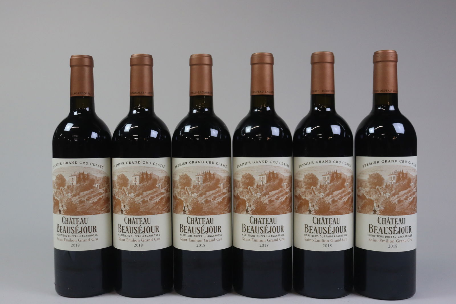 Château Beauséjour Duffau-Lagarrosse 2018: Château Beauséjour Duffau-Lagarrosse 2018 Saint-Émilion, 1er Grand Cru Classé B Excellent level and appearance R 12 bottles Per lot €1000 - 1300 Size bottles