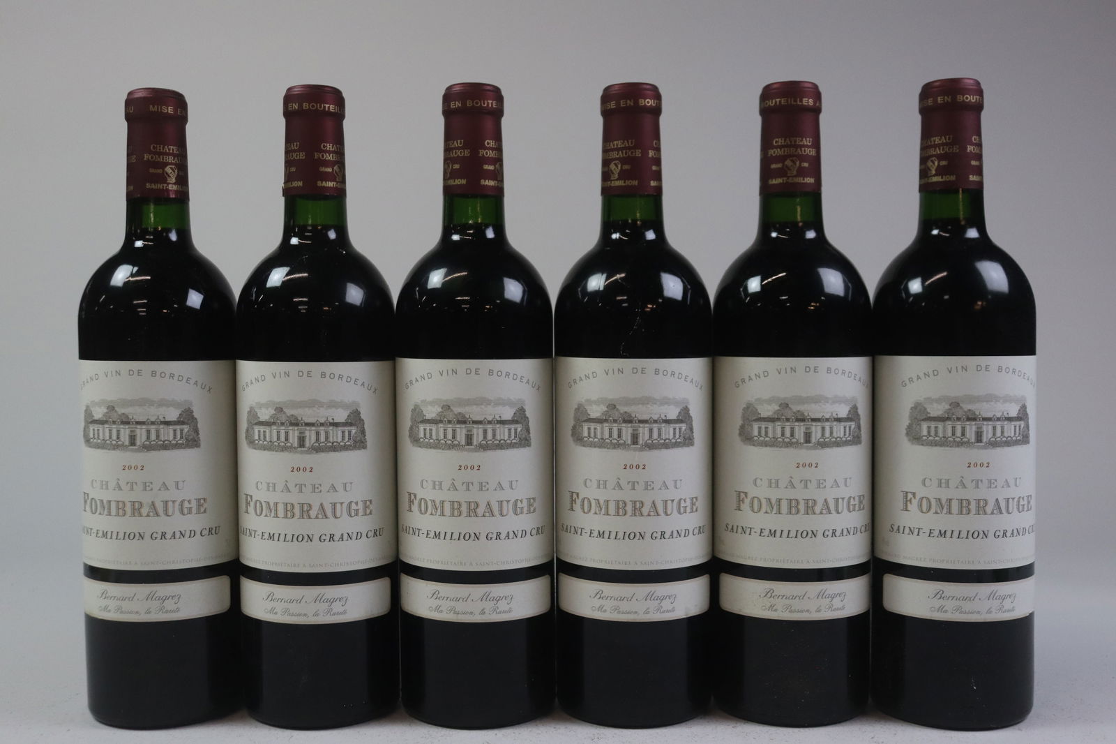 Château Fombrauge 2002: Château Fombrauge 2002 Saint-Émilion Grand Cru U. IN or better, excellent appearance R 12 bottles Per lot €260 - 360 Size bottles Condition U. IN or better,