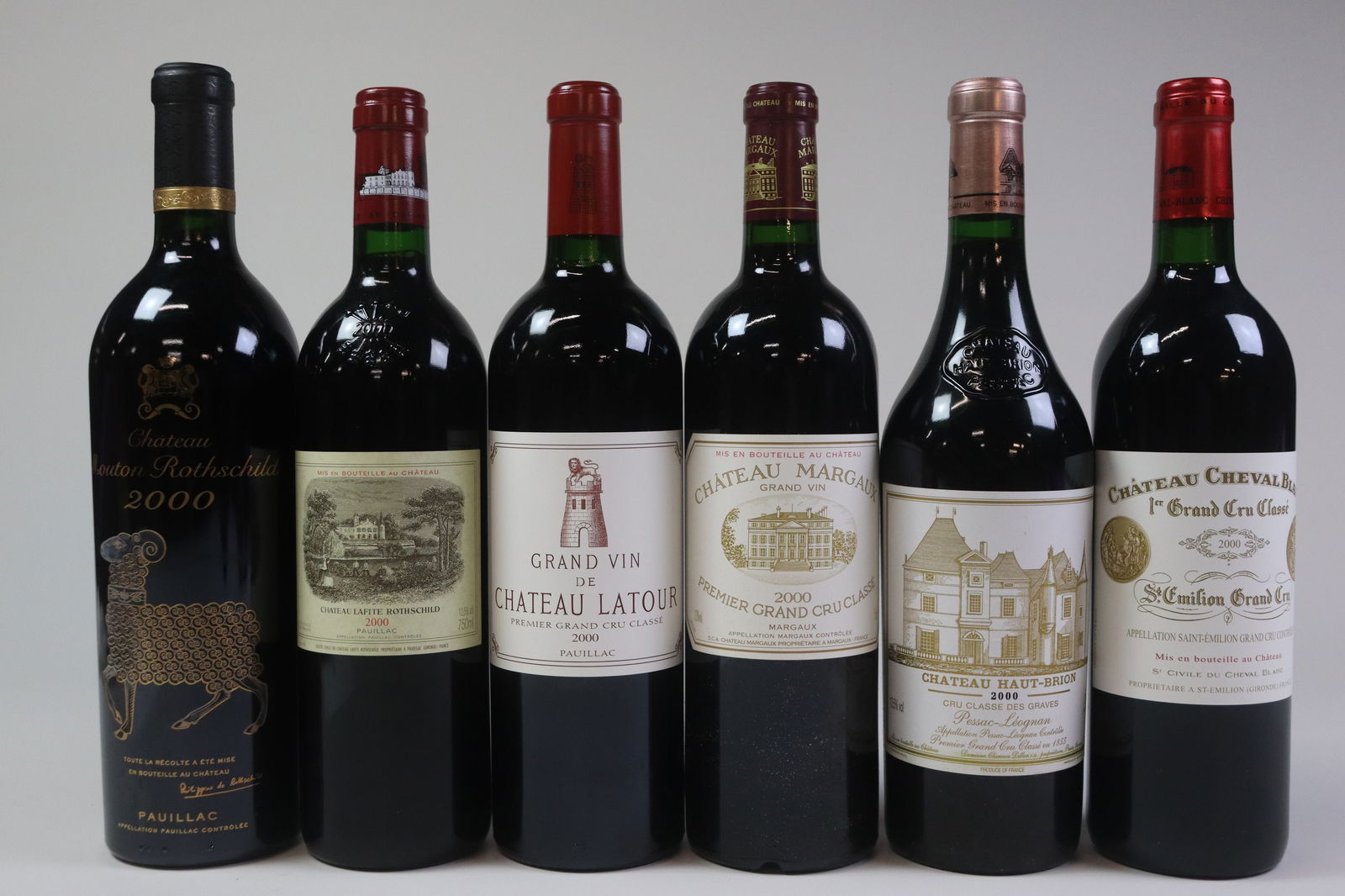 Les Premier Cru Classés Caisse Prestige Millésima 2000: Château Mouton Rothschild 2000 Pauillac, 1er Grand Cru Classé Excellent level and appearance R 1 bottle Château Lafite Rothschild 2000 Pauillac, 1er Grand Cru Classé Excellen
