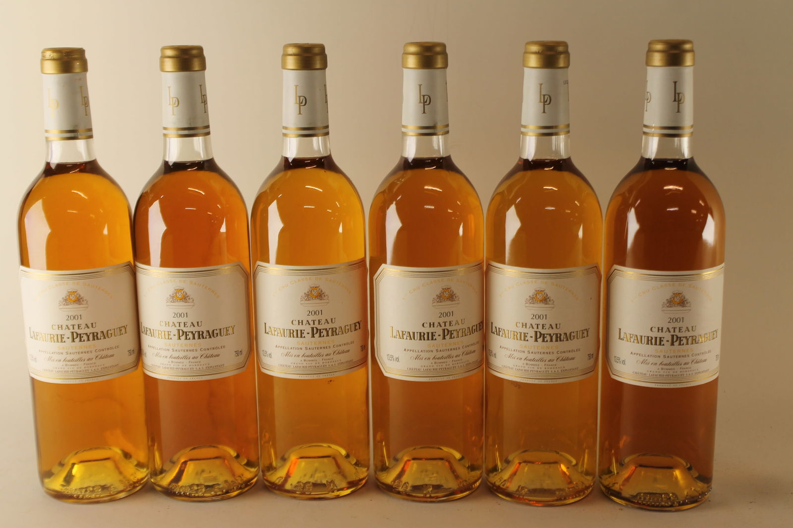 Château Lafaurie-Peyraguey 2001: Château Lafaurie-Peyraguey 2001 Sauternes, 1er Grand Cru Classé U. BN, excellent appearance W 12 bottles Per lot €440 - 550SizebottlesConditionU. BN, excellent appearanceExhibited(OWC)