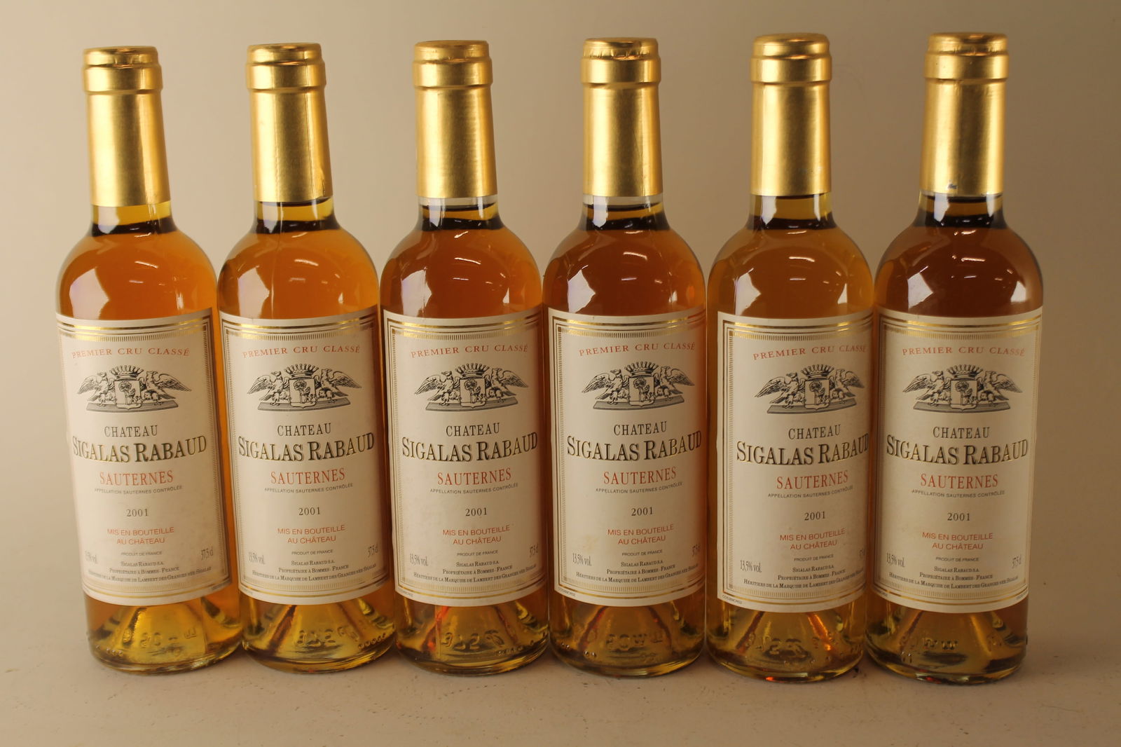 Château Sigalas Rabaud 2001: Château Sigalas Rabaud 2001 Sauternes, 1er Grand Cru Classé Excellent level and appearance W 12 half bottles - 375ml Per lot €260 - 360 Size half bottles - 375ml Con