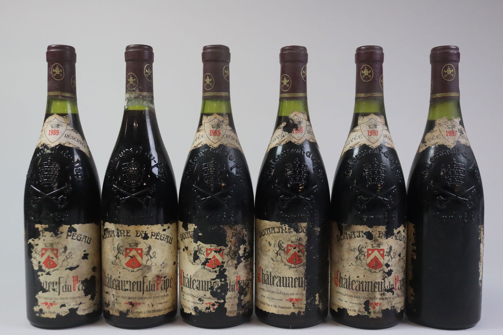 Châteauneuf-du-Pape 'Cuvée Réservée' 1989: Châteauneuf-du-Pape 'Cuvée Réservée' 1989 Domaine du Pégau, Châteauneuf-du-Pape U. 2.5cm BC or better, STL, SCL, 1TL, 1NOLN R 6 bottles Per lot €260 -