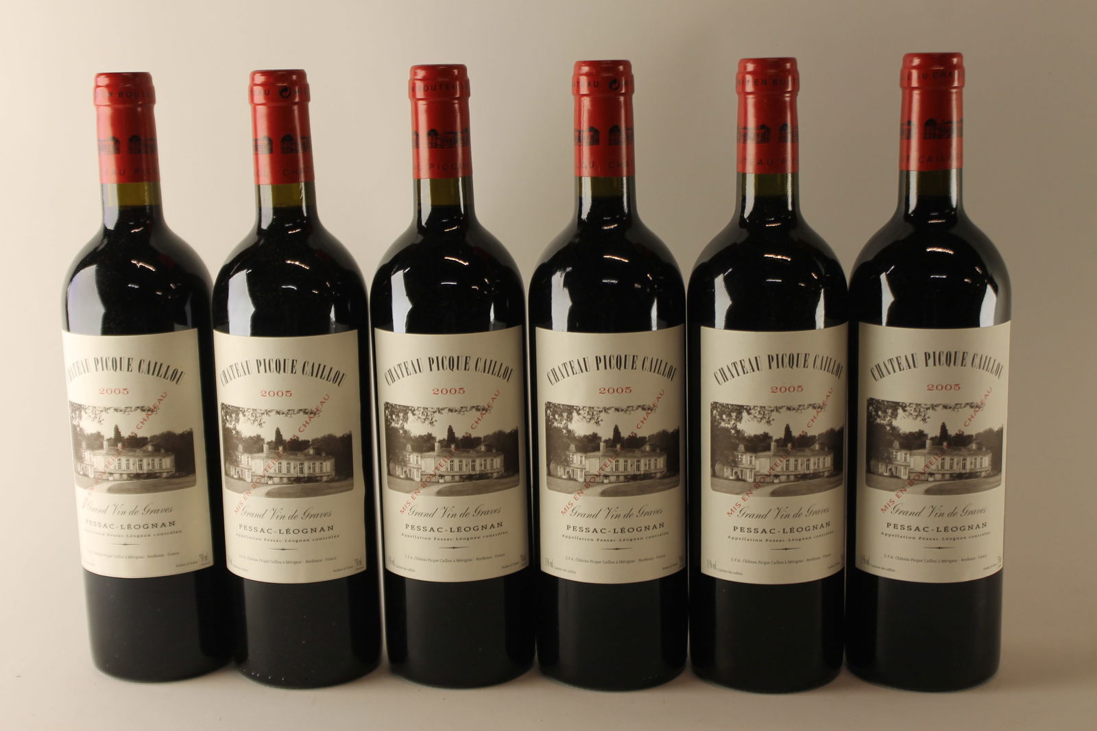 Château Picque Caillou 2005: Château Picque Caillou 2005 Pessac-Léognan U. IN, excellent appearance R 12 bottles Per lot €200 - 300SizebottlesConditionU. IN, excellent appearanceExhibited(OWC)
