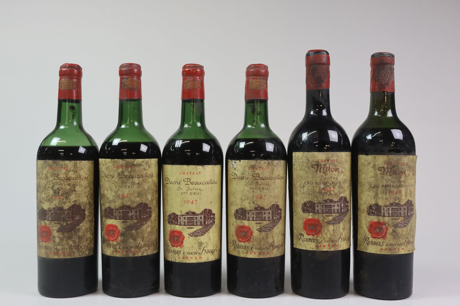 Mixed Lot Bordeaux DB 1947: Château Ducru-Beaucaillou 1947 Saint-Julien, 2ème Grand Cru Classé U. MS or better, STL, 1SPC, DB R 4 bottles Château Milon 1947 Pauillac, Cru Bourgeois U. HS, STL, LSCL, DB<