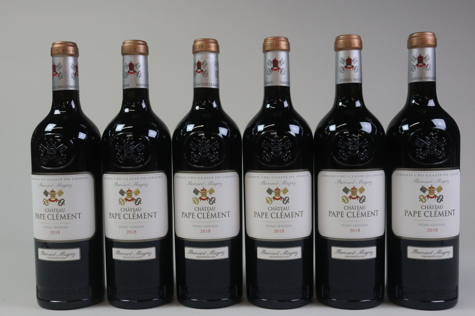 Château Pape Clément 2018: Château Pape Clément 2018 Pessac-Léognan, Cru Classé Rouge Excellent level and appearance R 6 bottles Per lot €320 - 420SizebottlesConditionExcellent level and