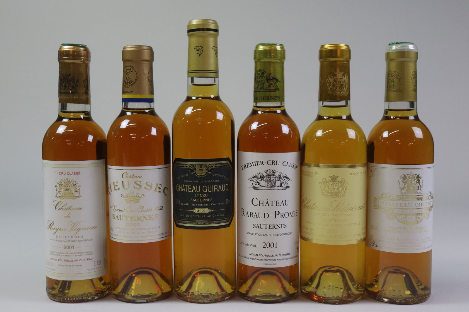 Mixed Lot Sauternes/Barsac, 1er Grand Cru Classé 2001: Château Rayne Vigneau 2001 Sauternes, 1er Grand Cru Classé Excellent level and appearance W 1 half bottle - 375ml Château Rieussec 2001 Sauternes, 1er Grand Cru Classé Exce