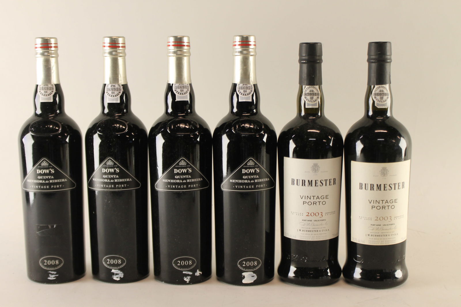 Mixed lot Vintage Port 2003/2008: Burmester Vintage Port 2003 Bottled in 2005 U. 3.5cm BC, excellent appearance F 2 bottles Dow's Quinta da Senhora da Ribeira Single Quinta Vintage Port 2008 Bottled in 2010 U. 3.5cm BC, excellen