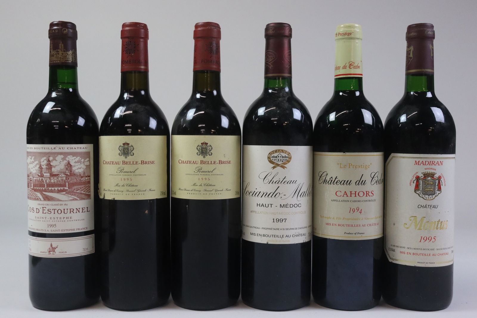 Mixed Lot France 1994/1995/1997: Château Cos d'Estournel 1995 Saint-Estèphe, 2ème Grand Cru Classé U. IN, LSTL, LSCL R 1 bottle Château Belle-Brise 1995 Pomerol U. IN, LSTL, LSCL R 2 bottles
