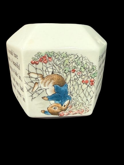 Wedgwood Peter Rabbit Hexagonal Money Box: The iconic Wedgwood Peter Rabbit Hexagonal Money Box from one of Britain's most celebrated potteries. A perennial favorite among Beatrix Potter enthusiasts and Wedgwood collectors alike.