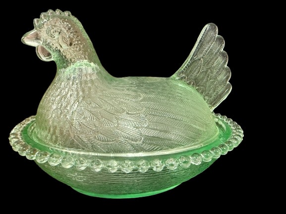 Indiana Glass Pastel Green Hen on Nest Candy Dish: A classic Indiana Glass pastel green hen-on-nest covered candy dish, a quintessential American pressed glass collectible. These pieces are among the most recognized and collected American glassware