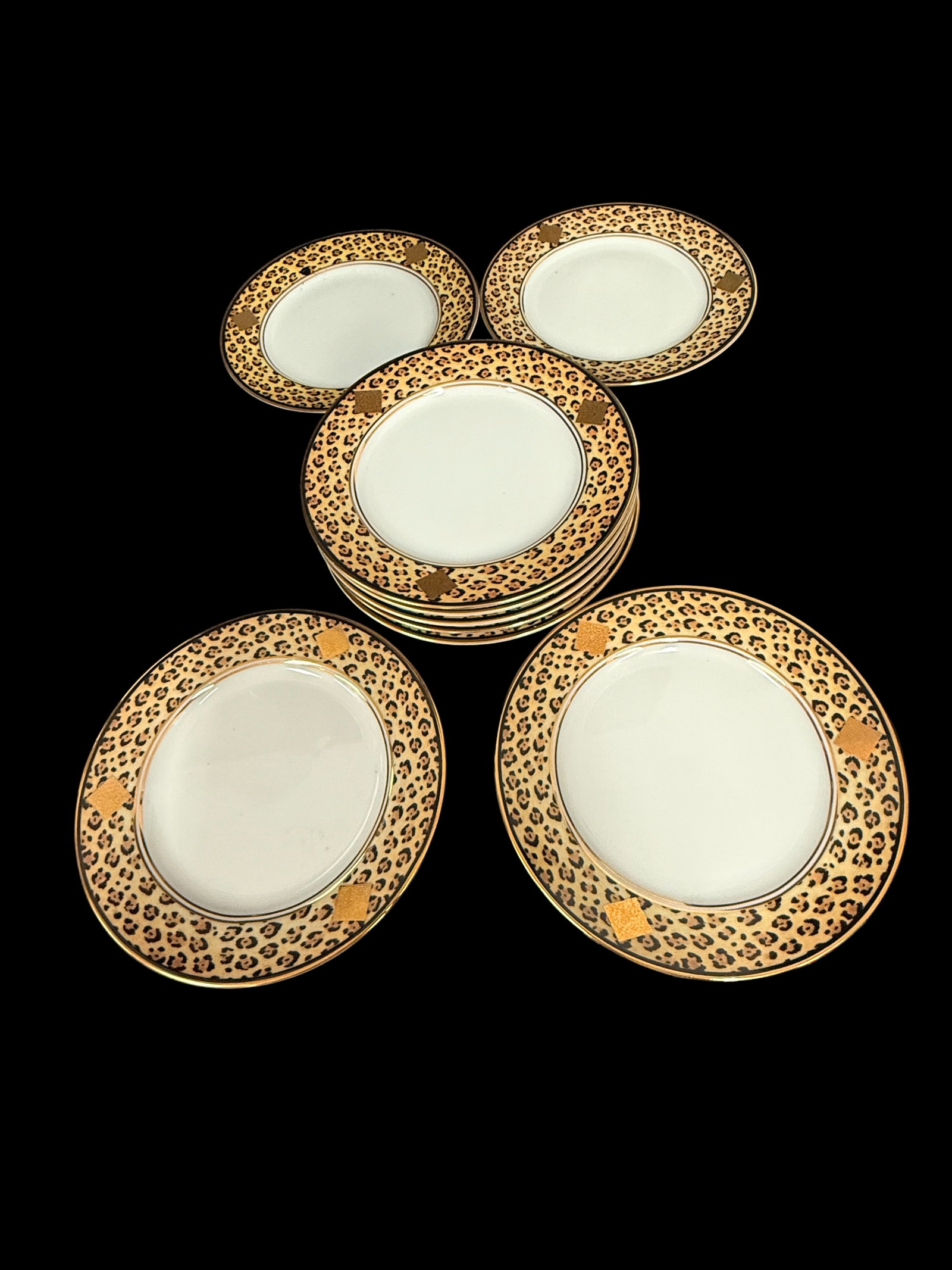 Lynn Chase Amazonian Jaguar Tiger Print Small Dessert Plates 6.5" set of 9: A magnificent set of nine (9) dessert/bread and butter plates from the Amazonian Jaguar collection by Lynn Chase Designs. Renowned for her wildlife conservation-focused artistry, Lynn Chase creates vi