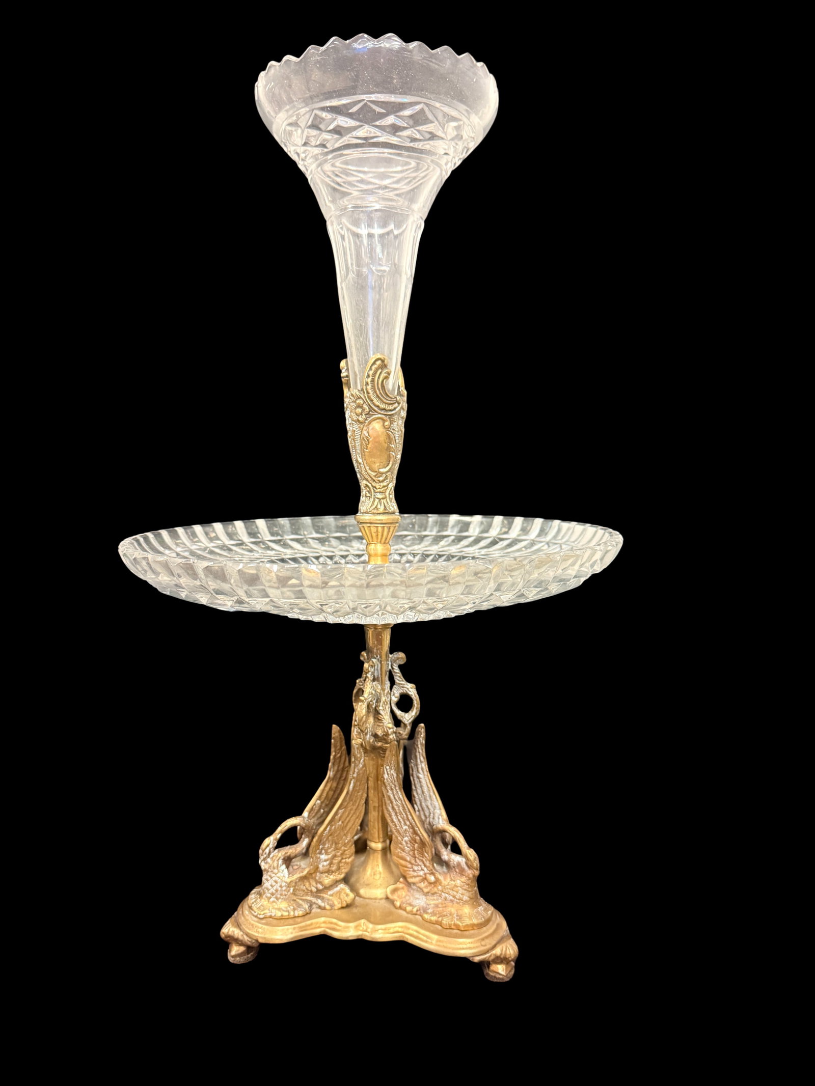 Metal and Glass Decorative Lattice Piece and Brass Bowl: A glass and metal decorative lattice or grid piece together with a brass bowl, offering warm metallic display appeal. Solid brass decorative pieces are sought for their weight and warm patina.
