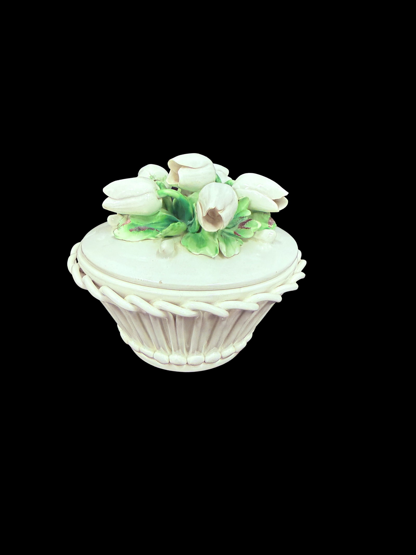 White Ceramic Compote with Flower Lid: A white ceramic compote with an elegant flower-adorned lid, a graceful and decorative serving piece. White ceramic compotes with decorative lids are classic collectible tableware pieces.