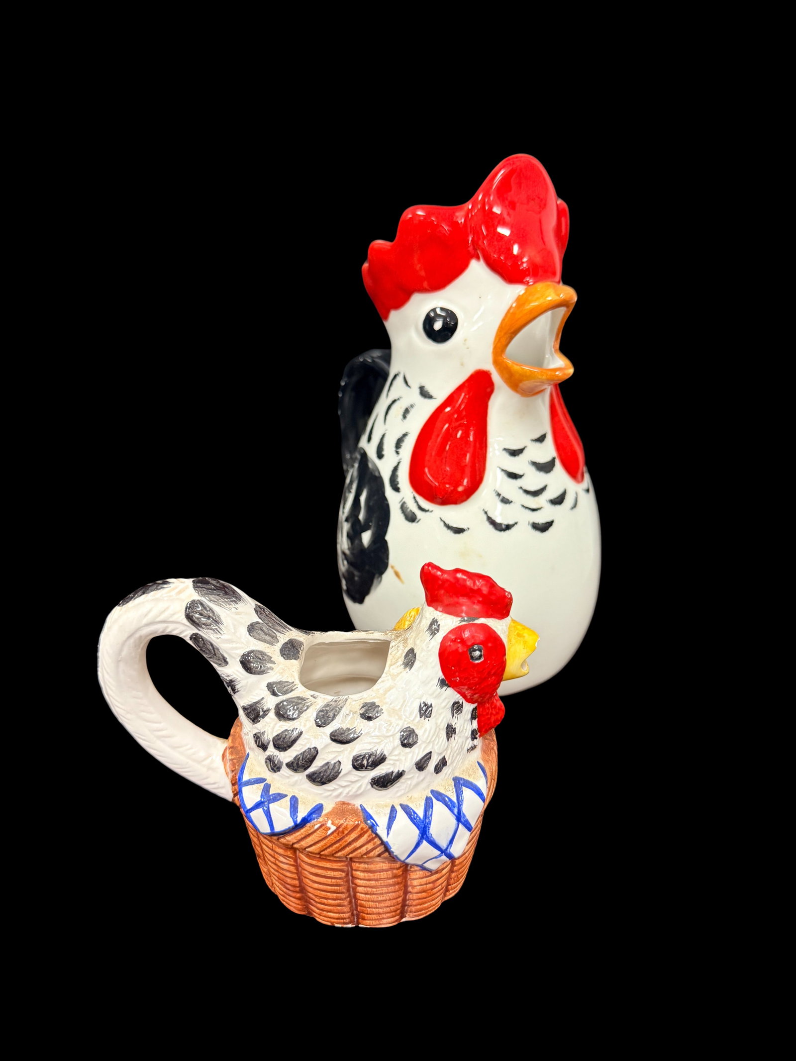 Red and White Rooster Ceramic Pitcher or Mug: A charming red and white rooster ceramic pitcher or mug with whimsical farm animal design. Rooster-themed kitchenware is a popular collectible category with a dedicated following.