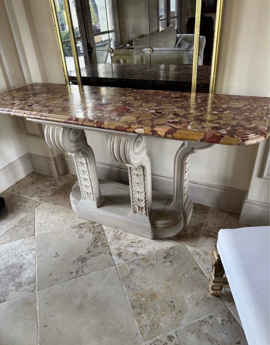 Neoclassical Breccia Marble Console: This neoclassical style console table features a substantial Breccia marble top with a bullnose edge and vibrant earthy tones. The architecturally inspired base is crafted in a light gray wash finish
