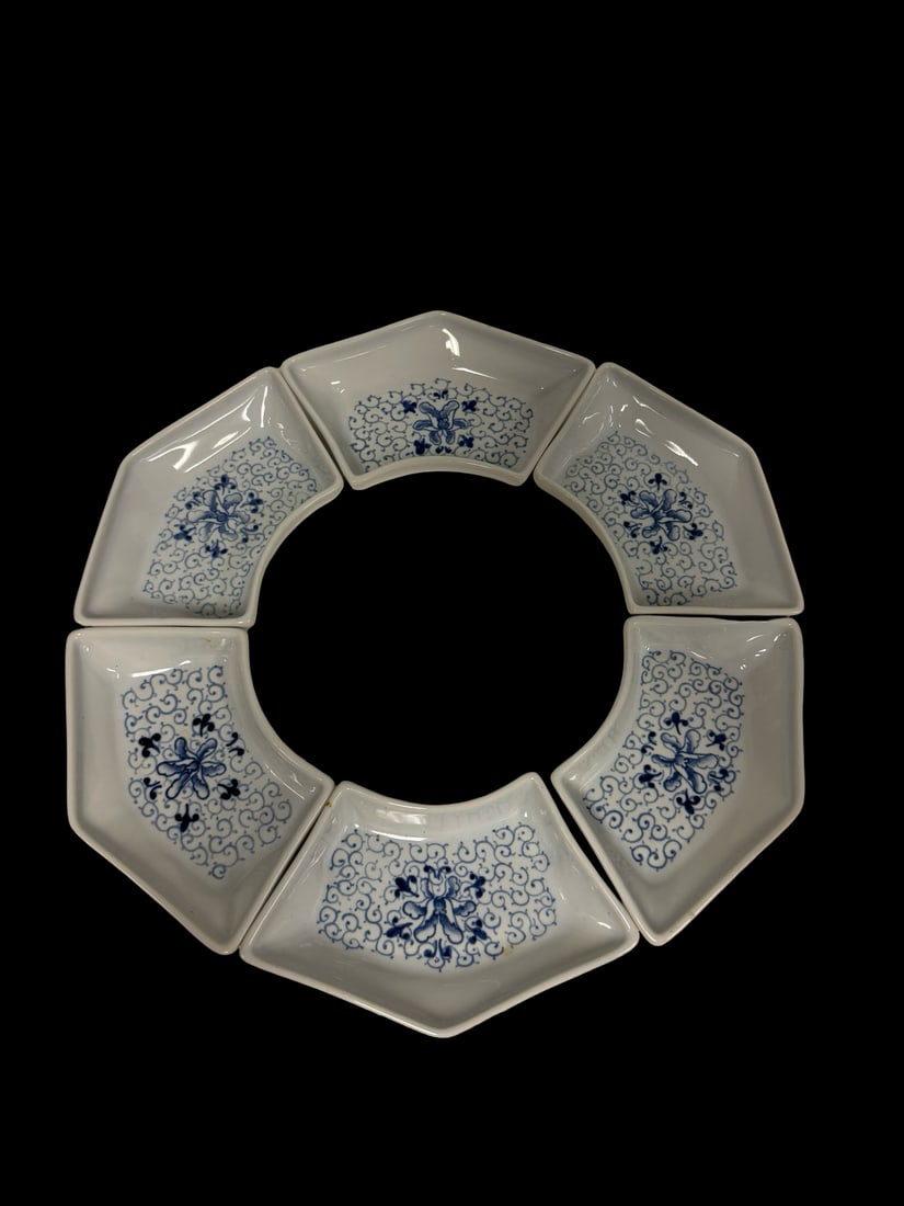 6pc Blue & White Porcelain Fan-Shaped Di: This set includes six fan-shaped porcelain dishes designed to form a circular arrangement for condiments or appetizers. Each piece features a delicate blue underglaze floral and scrollwork pattern on