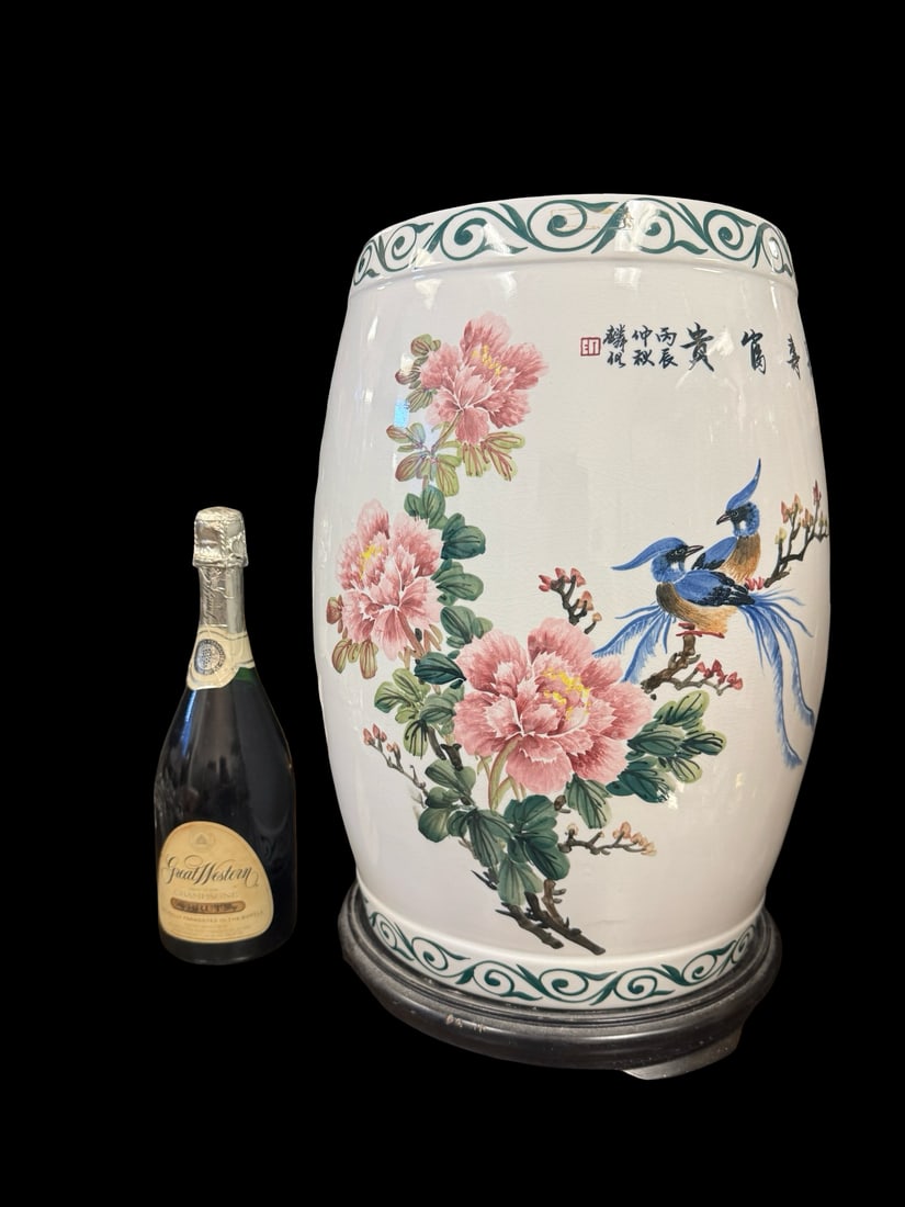Chinese Style Glazed Ceramic Garden Stoo: This large ceramic garden stool features a white crackle glaze body decorated with hand-painted floral motifs and blue birds on branches. The piece includes traditional pierced coin motifs on the top