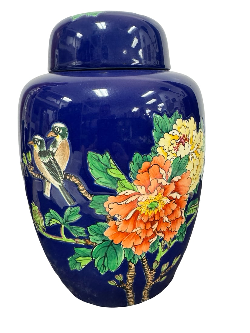 Large Cobalt Blue Floral & Bird Ginger J: This large ceramic ginger jar features a vibrant cobalt blue glaze decorated with hand-painted floral and avian motifs. The central design showcases blossoming orange and yellow peony flowers