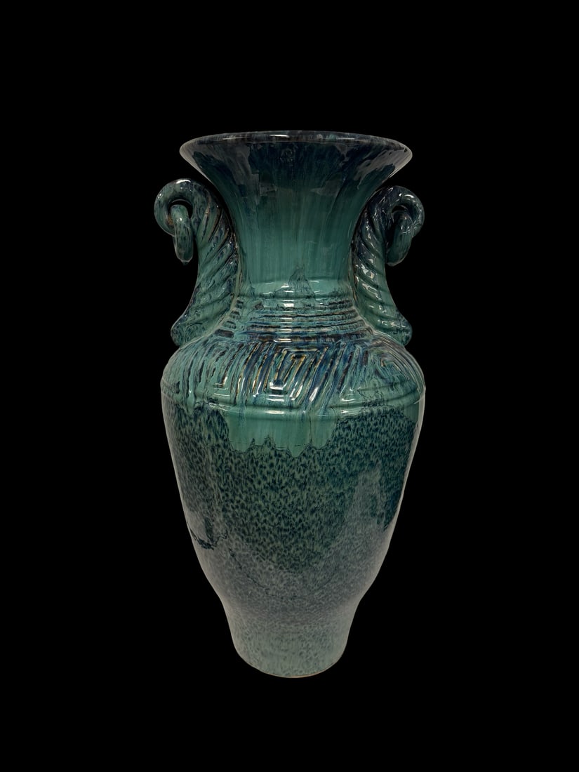 Large Glazed Ceramic Floor Vase w/ Mark: This large vintage floor vase features a striking turquoise and deep blue mottled glaze with a glossy finish. The vessel is designed with a flared rim, a ribbed shoulder, and two scrolled