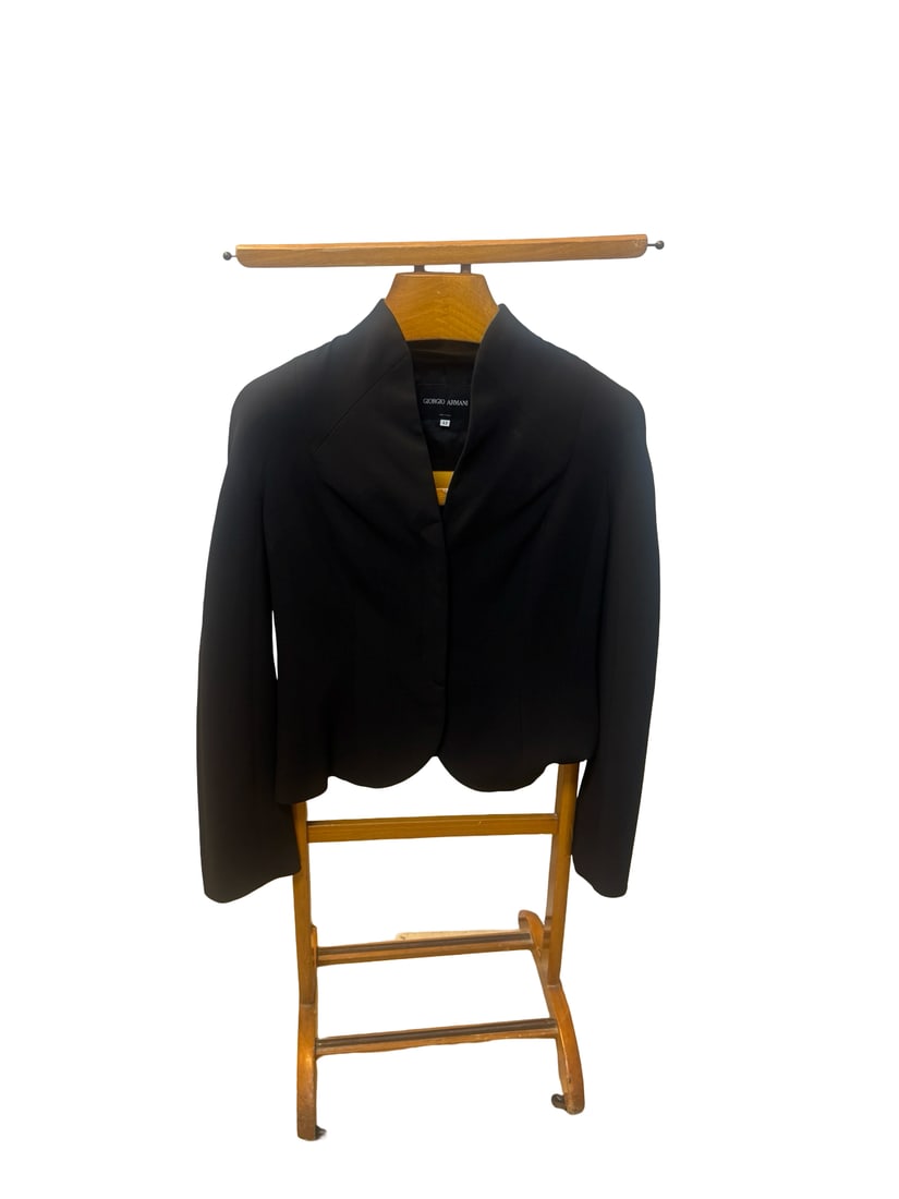 Giorgio Armani Style Cropped Jacket, 42: This Giorgio Armani style cropped jacket features a sophisticated stand-up collar and a single hidden front closure. The garment is designed with a contoured scalloped hem and structured shoulders