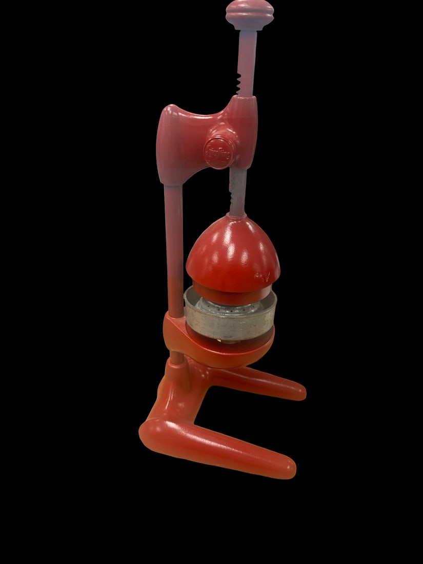 Vintage Juice King Manual Citrus Press: This vintage-style manual citrus press features a classic rack-and-pinion design marked Juice King. The cast metal body has been finished in a vibrant red paint, supported by a distinctive tripod base