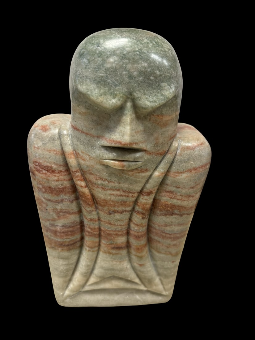 Modernist Banded Stone Sculptural Bust: A heavy hand-carved stone sculpture depicting a stylized human bust or figure in a minimalist aesthetic. The piece is crafted from a banded soapstone or similar metamorphic rock featuring prominent ho