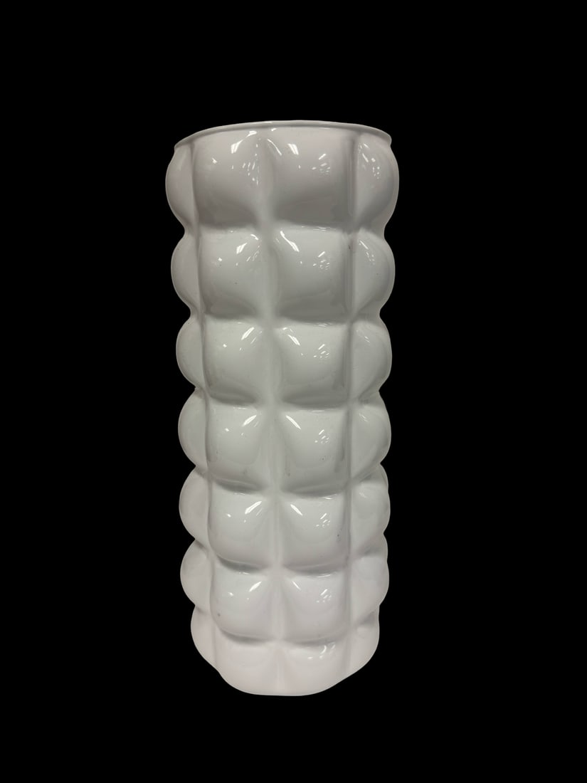 ArtCol Contemporary Recycled Glass Vase: This contemporary cylindrical vase features a bold, white quilted or bubble textured exterior with a glossy finish. It is constructed from 100% recycled glass, as indicated by the original