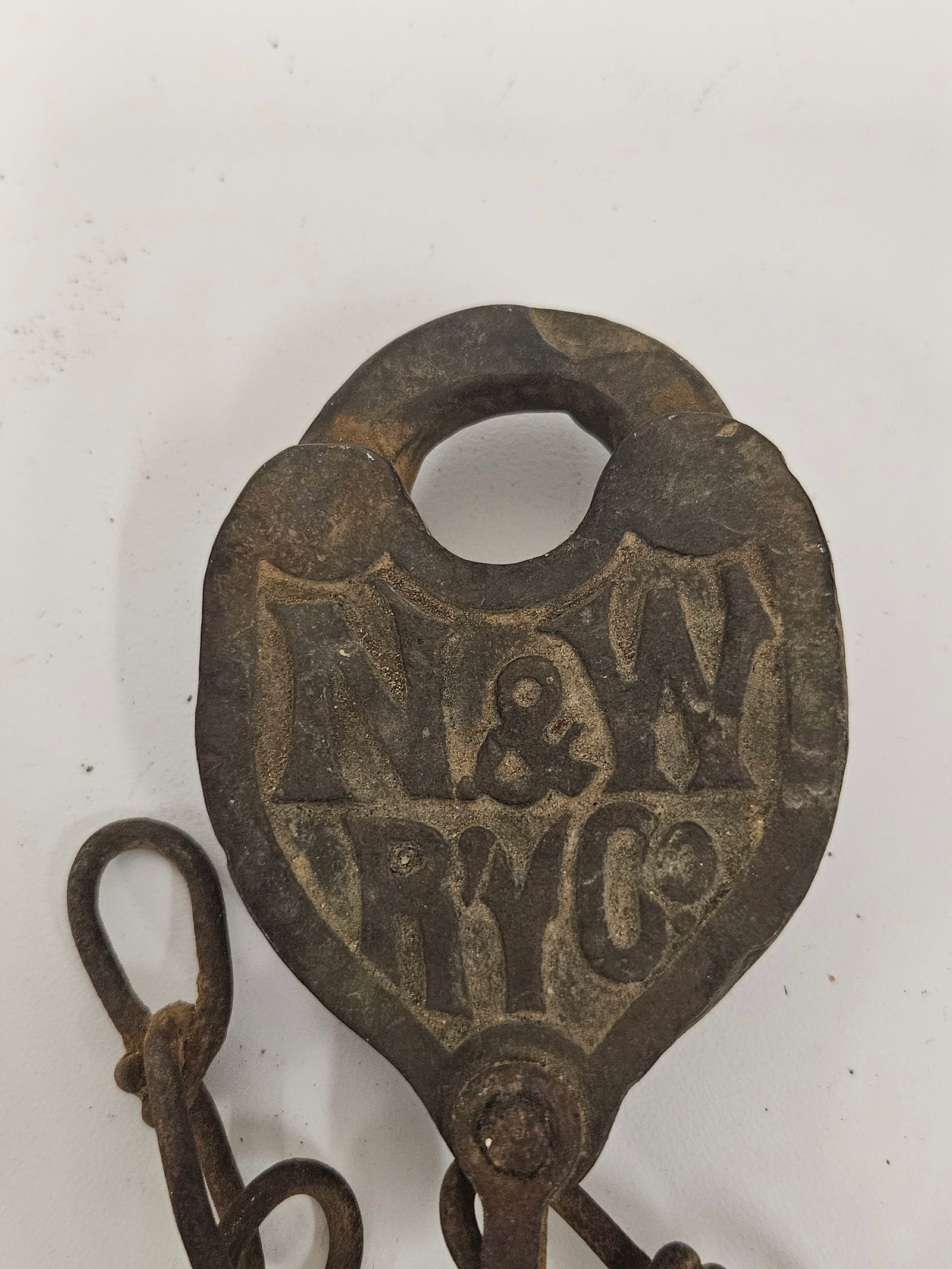 Antq Style N&W RY Co Railroad Padlock: Antique-style cast iron heart-shaped padlock featuring embossed 'N&W RY CO' lettering for the Norfolk and Western Railway Company. The lock includes a long, hand-forged style iron chain attached to th