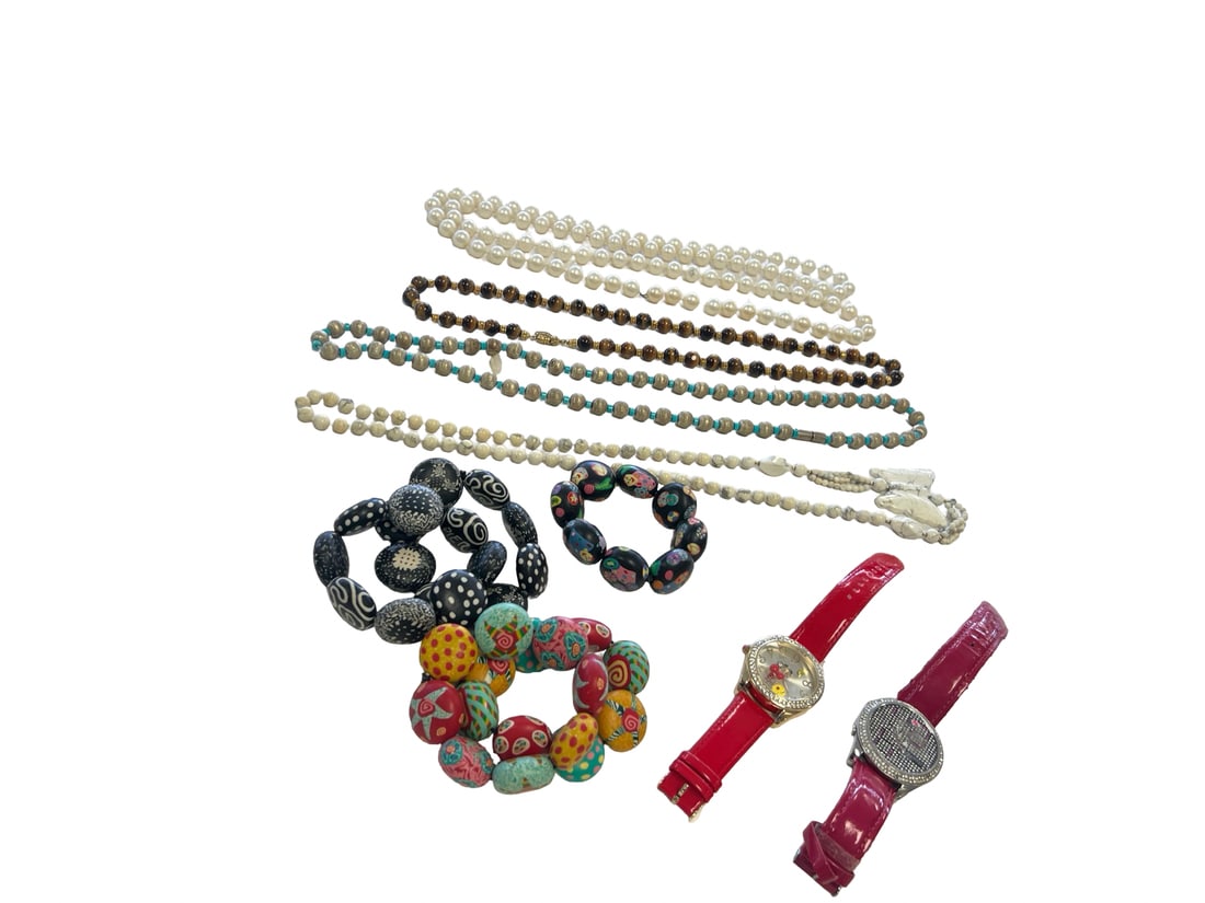 Estate Jewelry Lot with Beaded Necklaces: This eclectic jewelry lot includes a variety of beaded necklaces featuring tiger's eye, faux pearls, and a large carved butterfly pendant. The collection also contains several colorful chunky bead bra