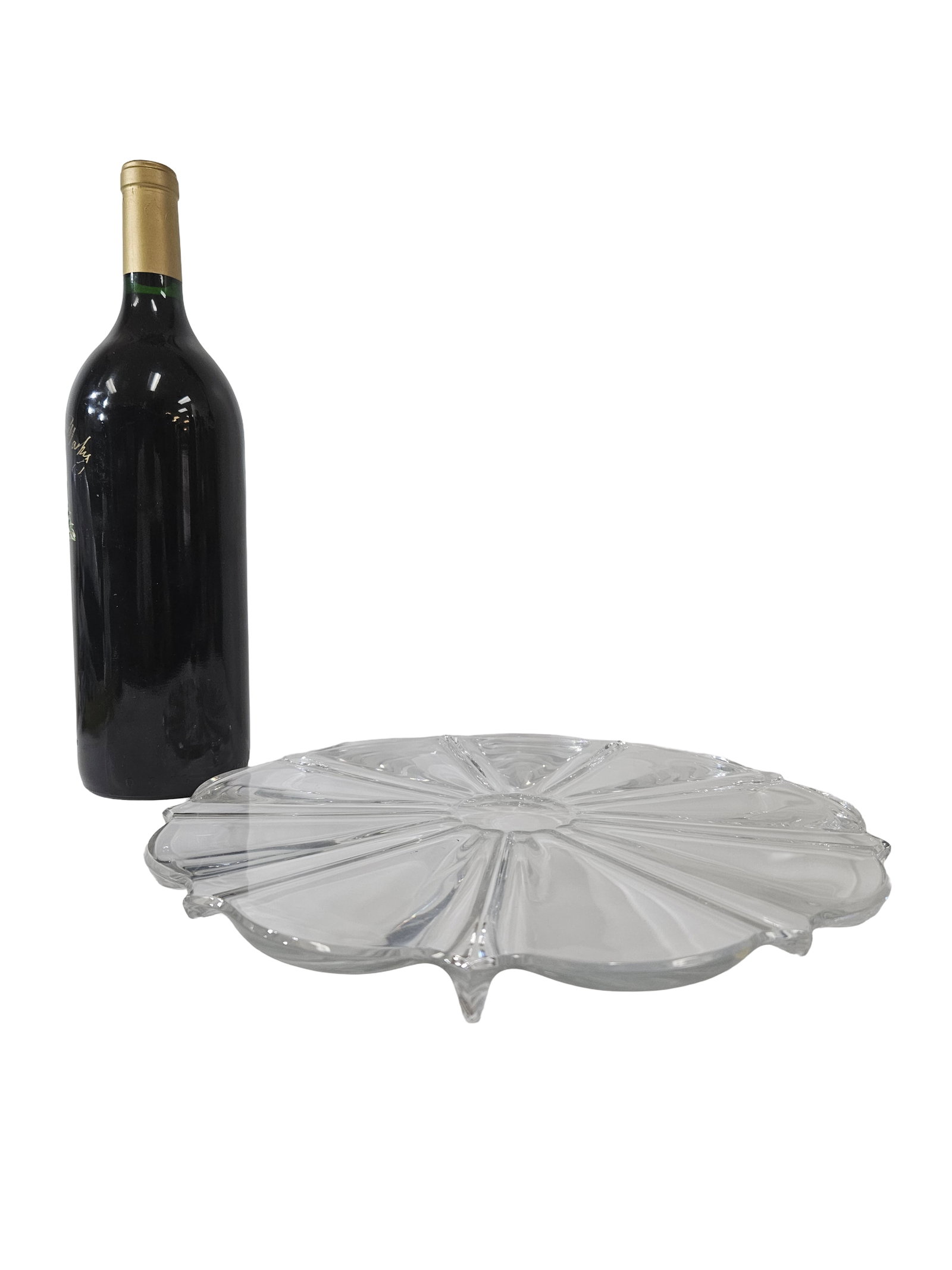 Syle of Tiffany Large Scalloped Sunburst: This large circular glass serving platter features a scalloped rim and a rayed, sunburst pattern radiating from the center. The heavy clear glass construction suggests it was designed for serving cake