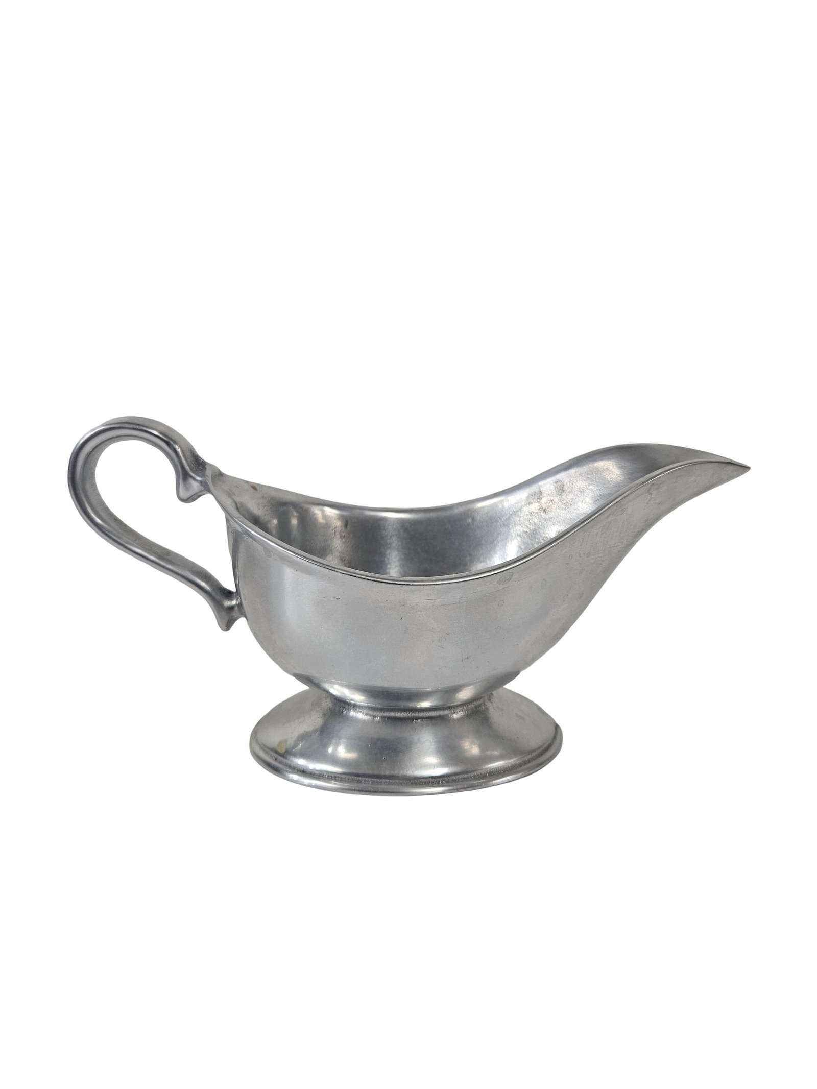 Vintage Wilton Armetale Style Gravy Boat: A vintage sand-cast aluminum sauce or gravy boat featuring a classic curved handle and weighted pedestal base. The piece is crafted from Armetale or a similar non-toxic pewter alternative, designed