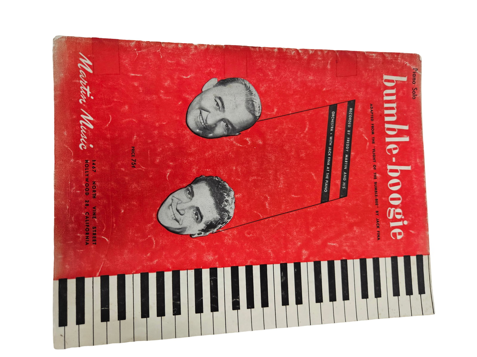 20 plus Lot Vintage Piano Sheet Music: This collection includes various vintage sheet music pieces and instruction books, featuring titles such as 'Bumble-Boogie' and 'Rhapsody in Blue.' The lot showcases a variety of musical styles from c