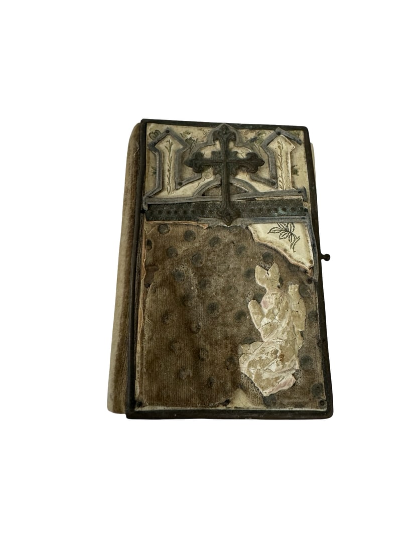 Antique Spanish Pequeño Manual Prayer: This antique Spanish prayer book, titled 'Pequeño Manual del Cristiano', features a heavily ornate cover with a metallic cross and figurative elements. Published by J. Steinbrener in Winterberg, the 